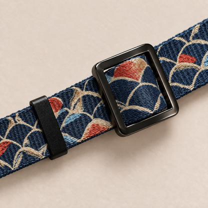 Close-up of adjustable slider on koi pattern collar