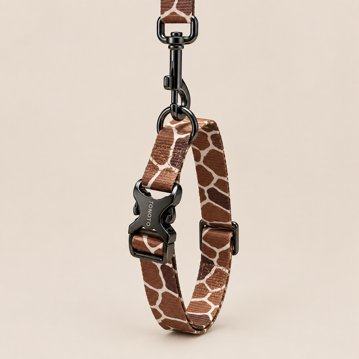 Giraffe pattern dog collar attached to lead