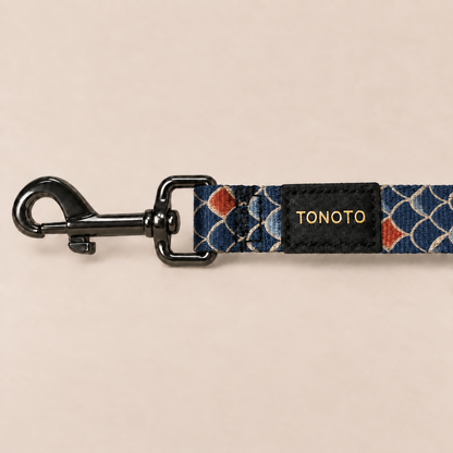 Close-up of koi pattern dog lead snap hook and TONOTO label
